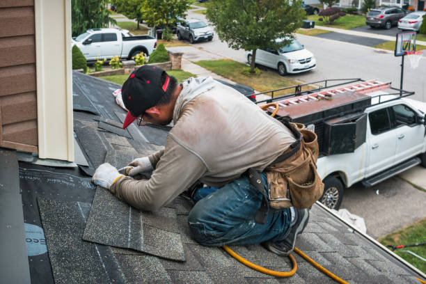 Professional Emergency Roof Repair technician working in Dawson, PA